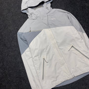 Grey and White North Face Raincoat Men's Medium